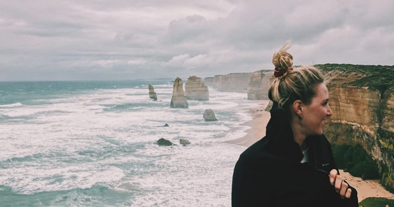 Girl standing in front of 12 Apostles formation
