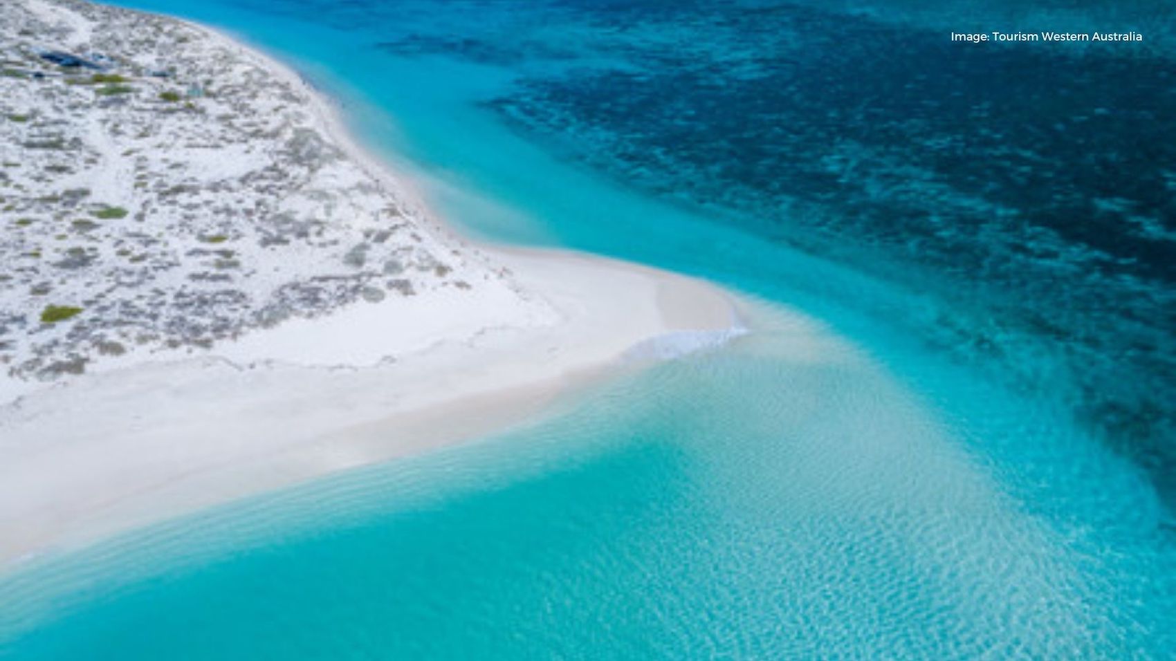 Bright turquoise water surrounding white beach | Tourism Western Australia